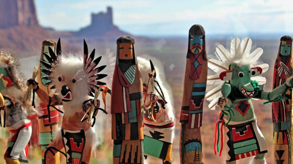 a group of native american totemas standing next to each other
