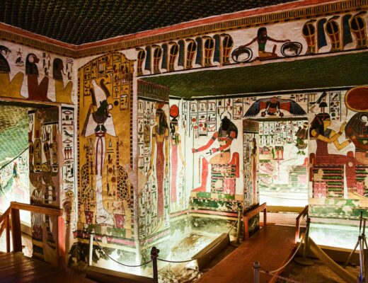 a room with egyptian paintings on the walls